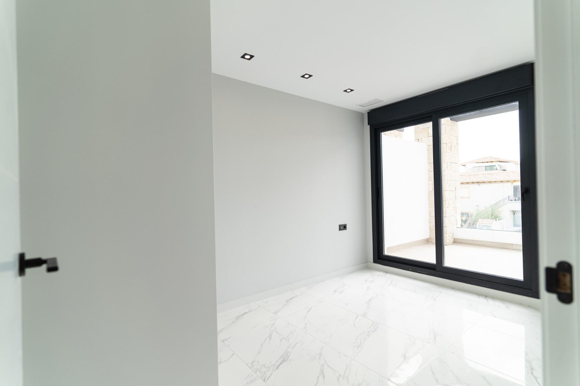 Obra nueva - Villa - Orihuela Costa - Punta Prima